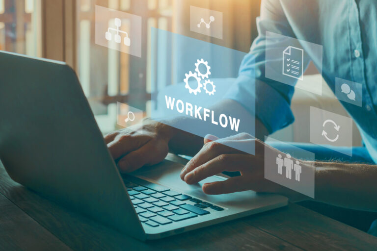 Image shows a man on a laptop to describe successful process optimization.