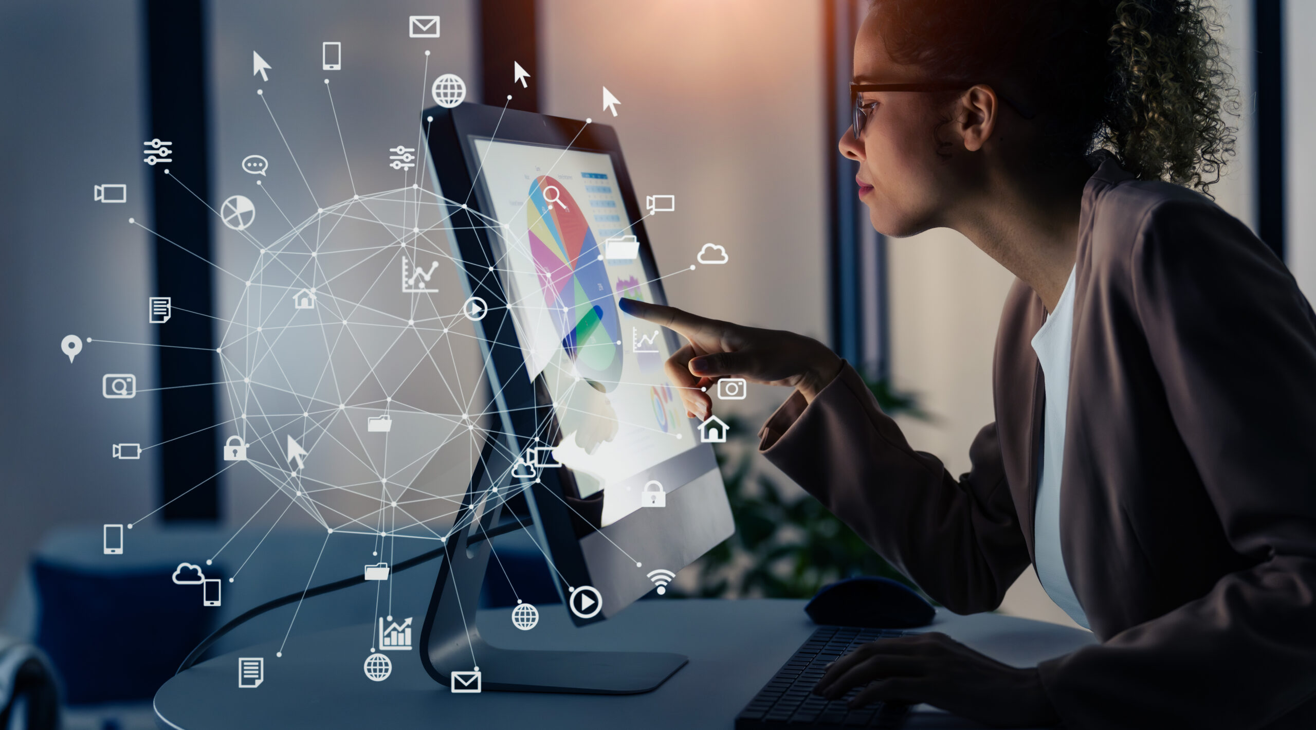 A woman working in office and communication network concept. ICT (Information Communication Technology). Cloud computing. System engineering.